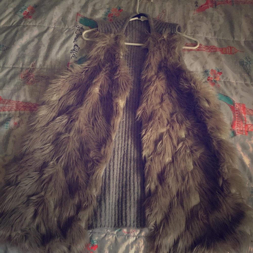 A fluffy grey dressy vest